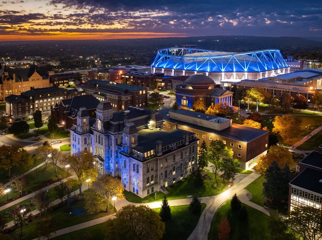 Campus lit up brightly at dusk.